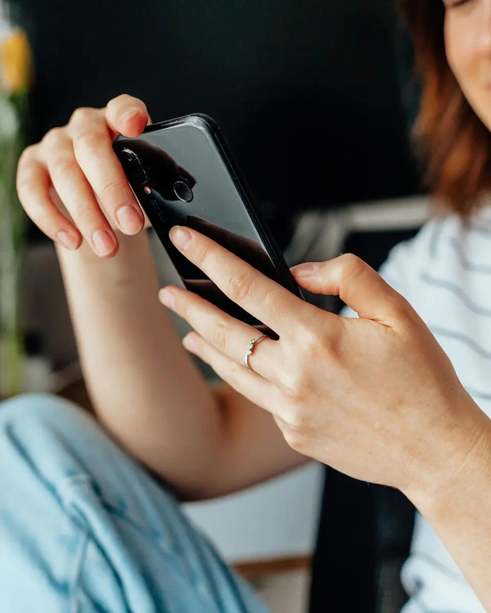 Hands holding a smartphone
